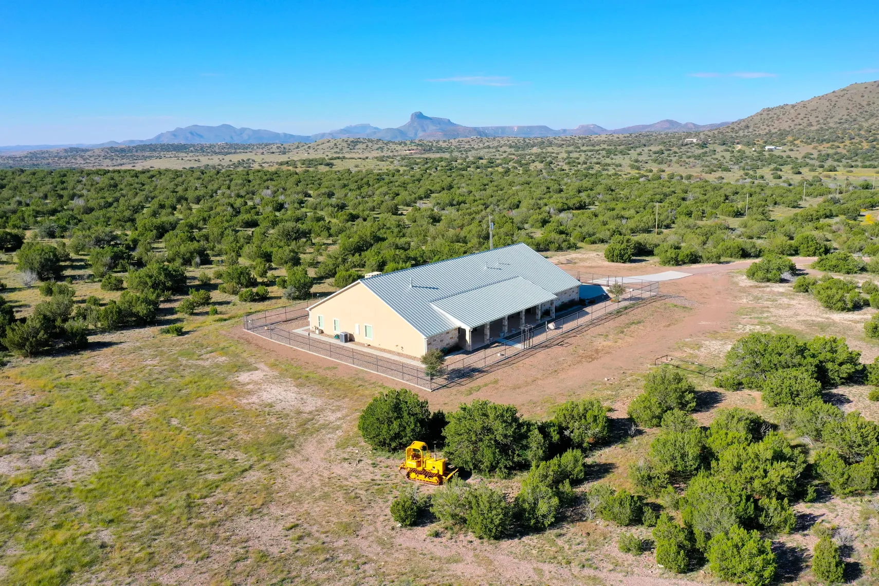 Aerial view of Greenbriar Ranch with the Davis Mountains beyond