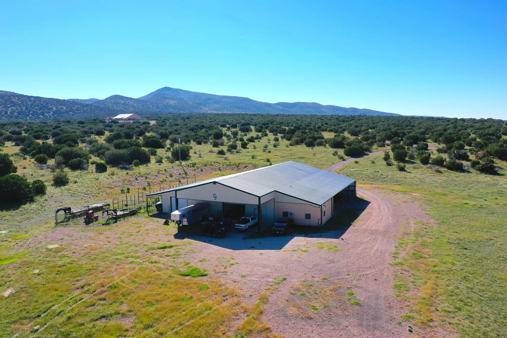 Aerial of the barn looking southeast toward the mountains